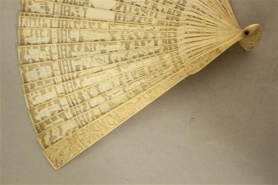 A Chinese export ivory brise fan, c.1900, 20cm.